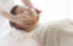woman receiving a facial massage