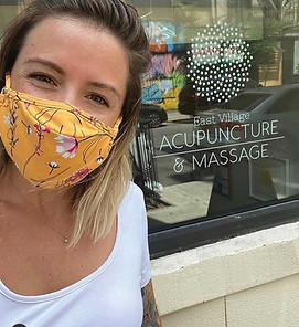 acupuncturist wearing a mask